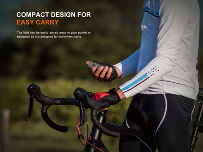 Cyclist holding a Fenix BC22R Bike Light with text about compact design for easy carry