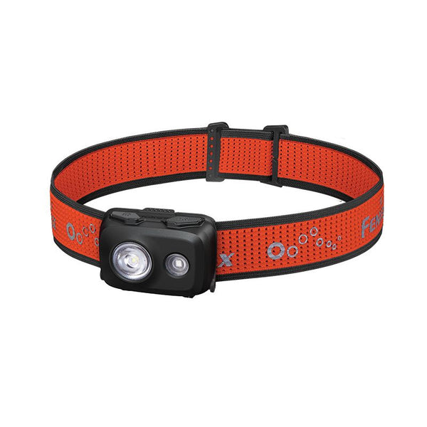 Compact black Fenix HL16 headlamp with an orange and black adjustable headband featuring LED lights on the front.