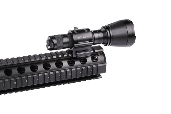 Flashlight attached to a riffle using Fenix ALG-00 Torch Rail Mount