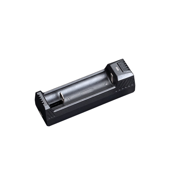 A black single-slot battery charger on a white background.