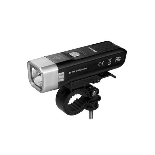 A black Fenix BC25R bike light mounted on a bike rack, featuring a LED light at the front and control buttons.