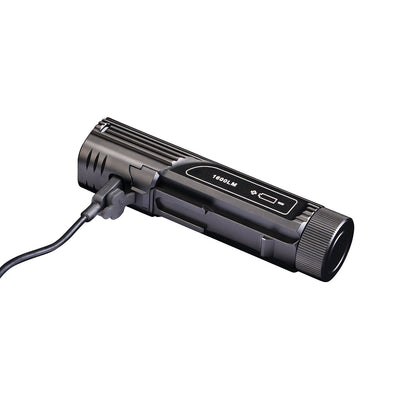 Fenix BC26R Bike Light with USB cable on a white background