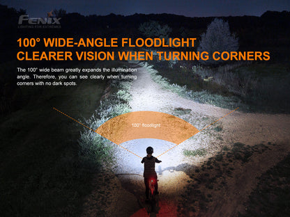 Person using Fenix BC26R Bike Light with a wide-angle floodlight feature in a dark outdoor setting.