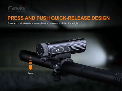 Fenix BC26R Bike Light mounted to bicycle handlebar on a dark background with text about quick-release design. 