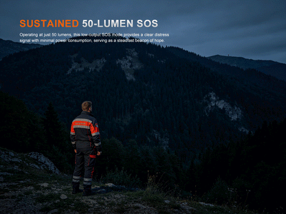 A man in search and rescue unform in the mountains looking at SOS signal sent with Fenix LR50R V2.0 Flashlight.