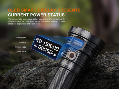 Fenix LR50R V2.0 Flashlight with OLED display on a rock, showing power status information.