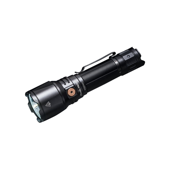 A black Fenix TK26R tactical flashlight with a LED light source and a battery indicator on the side.