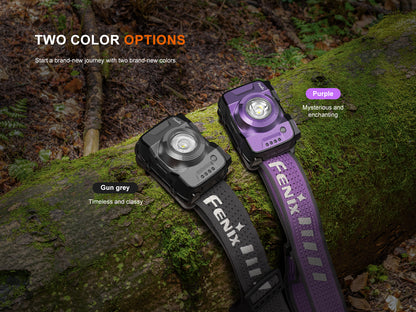 Two Fenix HL12R V2.0 Headlamps, one gun grey and one purple, on a mossy log with a forest background.