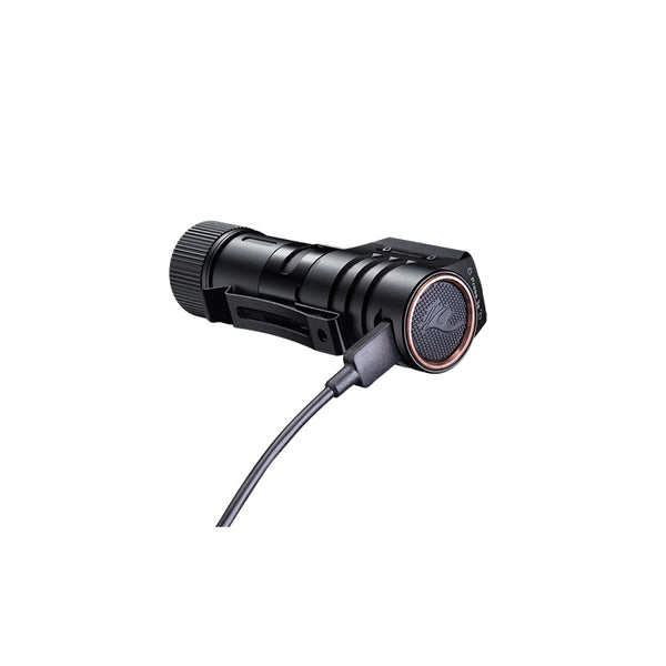 Fenix HM71R Headlamp with a charging cable on a white background