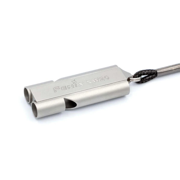 Metal whistle with keychain on a white background