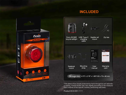 Packaging of Fenix BC06R Tail Light  with included items on a road with blurry background. 